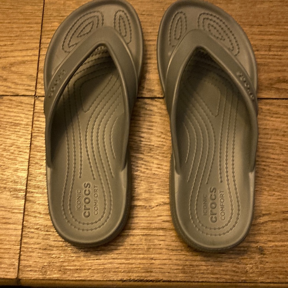 Gray crocs flip-flops